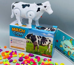 Funny Walking Musical Milch Cow Toy For Kids – Black & White Electric Animal With Lights, Sound & Moving Tail